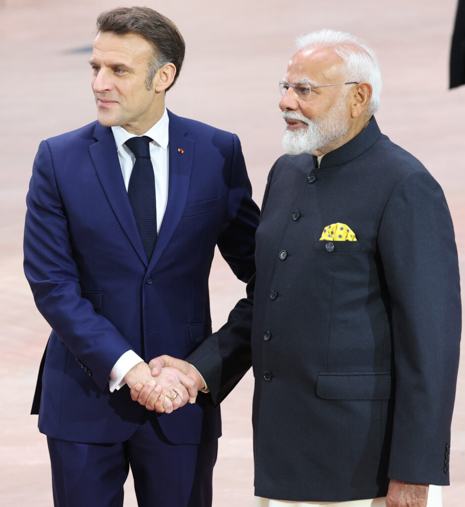 Delegates exit the Grand Palais under its glass roof after the closing session of the AI Action Summit co-chaired by France and India.