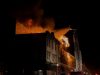 North Jakarta House Fire Kills Four Firefighters battle a blaze at a two-story house in North Jakarta as smoke billows into the night sky.
