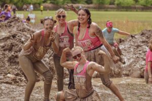 Thousands embrace mud and purpose at Heaton Park Pretty Muddy run.