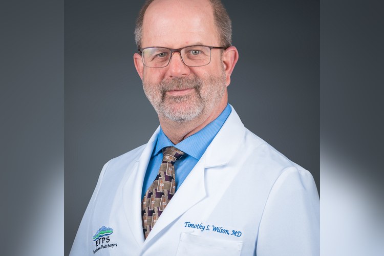 Dr Timothy W Synold