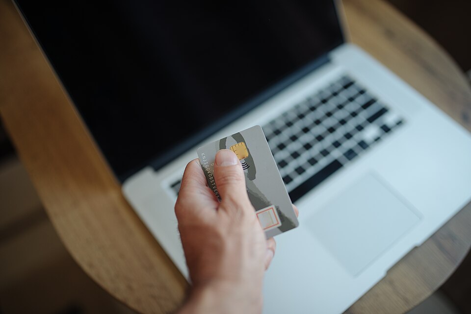 Person Holding A Credit Card