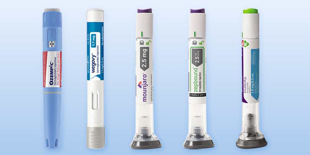 Scientist loads GLP-1 injector pen while research screens show blood-sugar and weight-loss graphs in a modern lab.